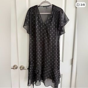 White House Black Market Black Sheer dress with diamond shaped gold flecks .